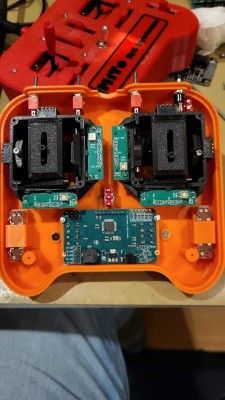 ...the inside before wirering, you will notice the pcb's on the sticks which actually allows to set individually the gain for each trim...Mickey Mouse solution when you run out of analog ports