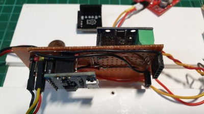 blue H-Bridge plugs onto bottom of board