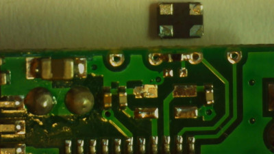 Crystal removed. Its smaller than a match head.